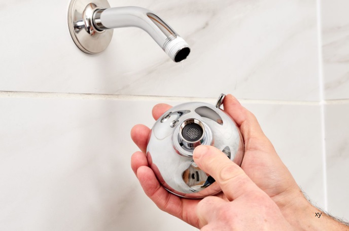 https://www.carpetcleaningforce.co.nz/wp-content/uploads/2023/05/Reinstalling-the-shower-head.jpg